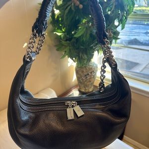 Plicate leather bag made in Italy